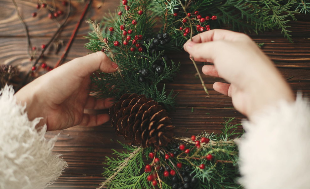 image of hands making a wreath