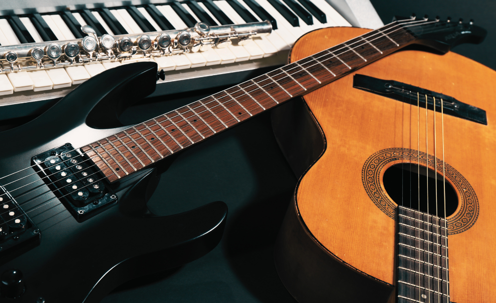 A juxtaposition of an electric keyboard, a clarinet, an electric guitar, and an acoustic guitar in natural color.
