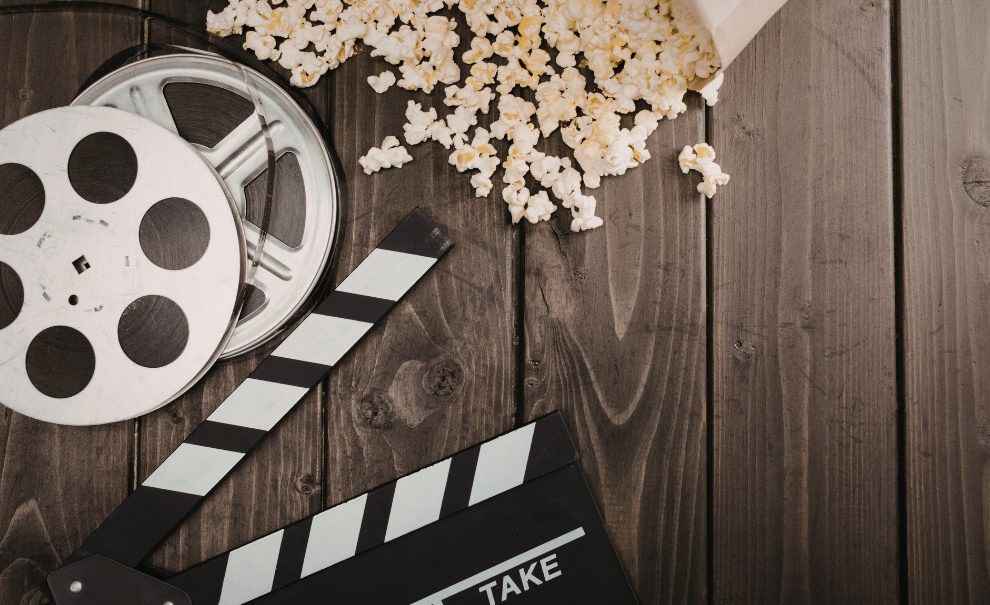 Film reel with spilled popcorn