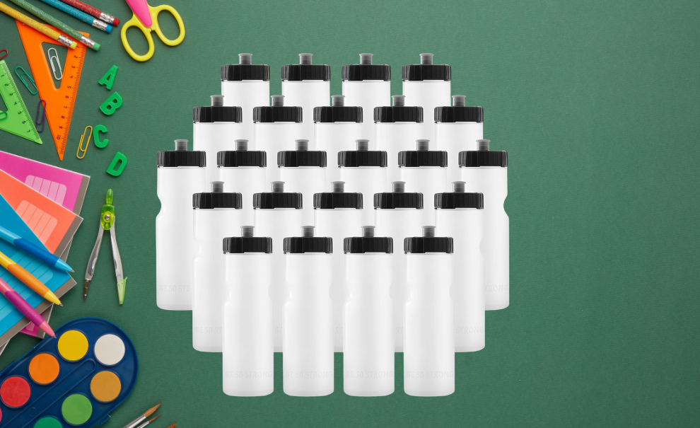 Back to School Items laid out on a green background and a collection of blank white water bottles.