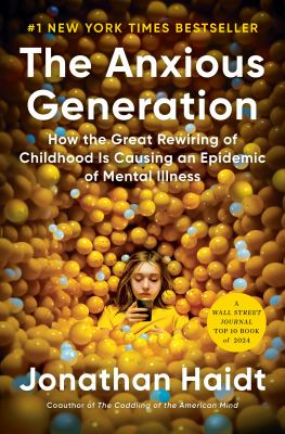 Book Cover:a child on their phone in a yellow and blue ball pit
