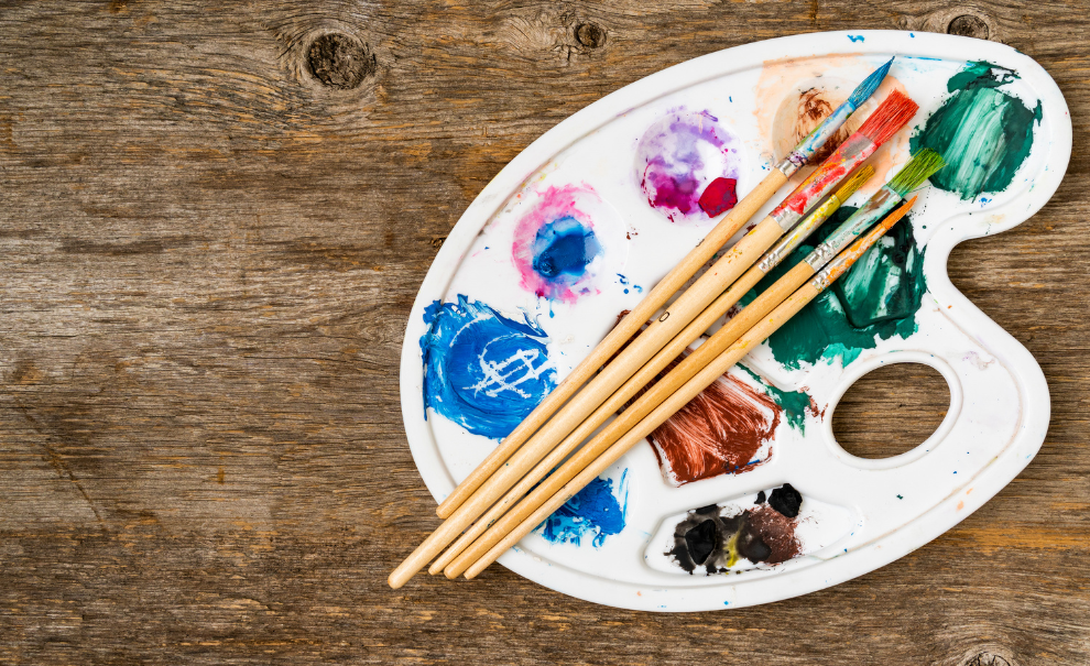Paint palette with brushes