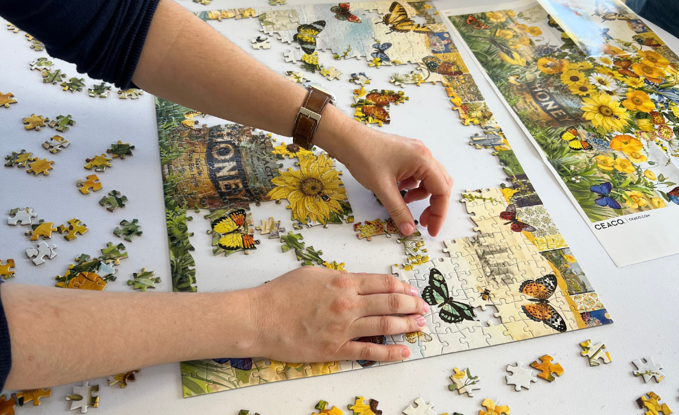 Person doing flower puzzle