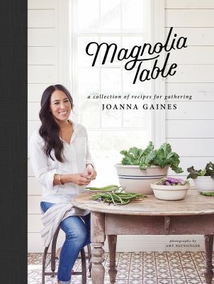 Book Cover:A woman sitting at a table full of vegetables 
