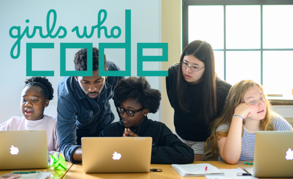 girls who code logo on image of students coding with an instructor