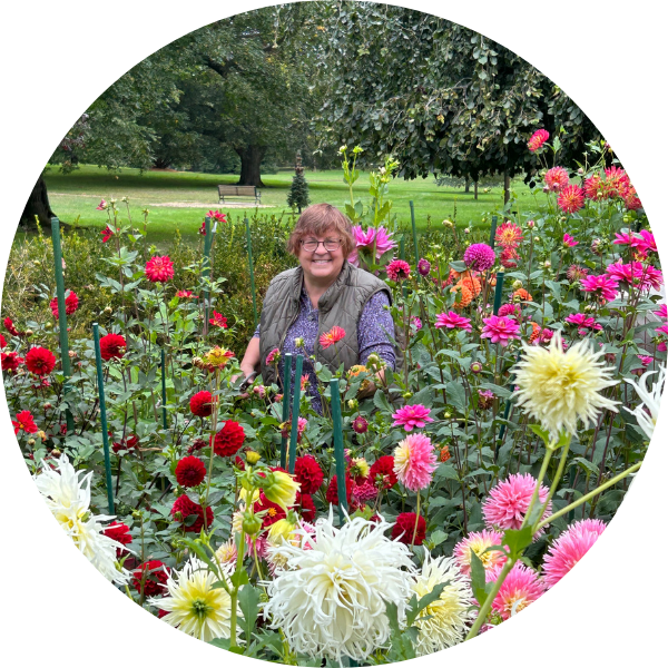 image of woman with dahlias