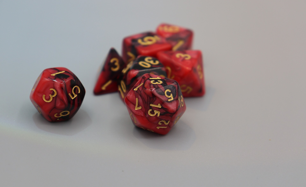 black and red dungeons & dragons dice