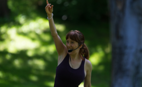 image of woman stretching outdoors