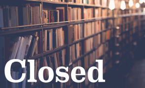 book stacks and lightbulbs hanging low