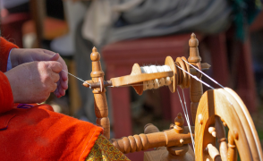 Woman spinning yarn