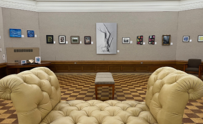 Paintings hanging in gallery