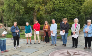 group of people gather on the park's esplanade