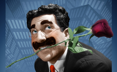 man with rose in mouth
