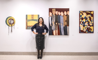 Cristina Querrer with her works on exhibit